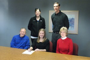 Mount Vernon (Indiana) High School senior Megan Martin recently signed a letter of intent to play volleyball next fall for John A. Logan College. Seated with Martin are her parents, John and Julie. Standing are her high school coach, Andi Allford, and Vols head coach Bill Burnside. (Photo provided) 