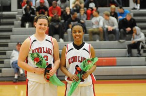 SOPHOMORE NIGHT - Sophomore basketball players, FROM LEFT, Jennifer Moeller (Nashville) and Tazonda Gibbs (Detroit) were recognized as part of the RLC Homecoming celebration on Feb. 20.