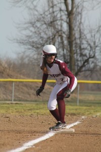 Katie Sandusky leads off from third base in action against Shawnee.