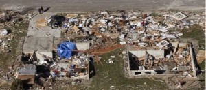 This aerial view on Monday, Nov. 18, 2013, shows homes that were destroyed by a tornado that hit the western Illinois town of Washington on Sunday. It was one of the worst-hit areas after intense storms and tornadoes swept through Illinois. The National Weather Service says the tornado that hit Washington had a preliminary rating of EF-4, meaning wind speeds of 170 mph to 190 mph.