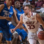 Saluki forward Sean O' Brien drives around Billiken defender Jalon Johnson