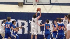 Bollinger goes up for two to lead all scores with 18 in a 57-42 loss to Vienna (WSIL TV photo)