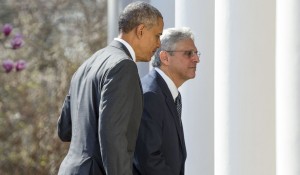 Lame duck president Obama and Merrick Garland, who he is trying to sneak on the Supreme Court before he leaves office. (AP photo)