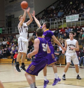 Derek Oxford shoots over a Carlyle defender. He had 10 points on the night including a game winning FT....