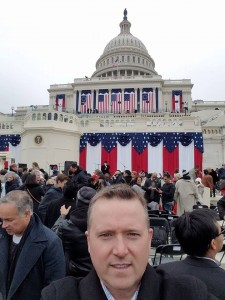 Travis Clem at the inauguration with the US Capitol building in the background.