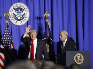 President Donald Trump, followed by Homeland Security Secretary John F. Kelly, waves as he steps off stage after speaking at the Homeland Security Department in Washington, Wednesday, Jan. 25, 2017. (AP Photo/Pablo Martinez Monsivais)