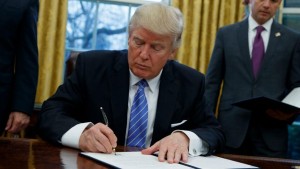 President Trump signing and executive order ending the Trans Pacific Partership (Fox News Photo)