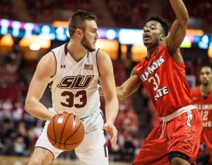 SIU Senior Sean O'Brien looks to drive around ISU defender Javika Thomspon