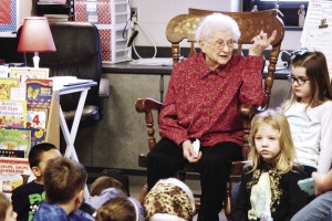 Louise Justhi was explaining life growing up to her great granddaughters kindergarten class in the Northern Illinois community of Peru for their 100th day of school celebration.  (Lasalle News-Tribune photo. 