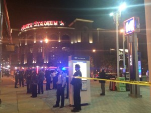 St. Louis police officers and detectives are investigating the crime scene at Busch Stadium early this morning.  (Post Dispatch Photo)