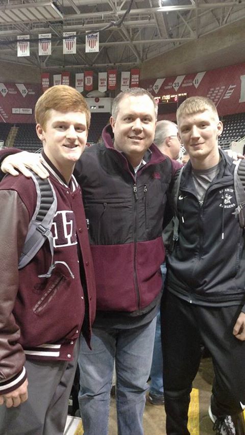 Derek Oxford (left) Benton Coach Ron Winemiller (center) and Timmy Henson (right) at Carver Arena in Peoria, Thursday 