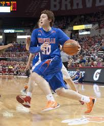 Okawville's Noah Frederking driving the lane in yesterday's state championship game.  He will continue his playing career with Marty Simmons' Evansville Purple Aces (St. Louis Post Dispatch photo)