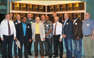 Members of the 1983-84 Warrior Basektball Team. FROM LEFT: Jeff Cochren, Todd Stoermer, Dean Merder, Myron Hawkins, Jamie Raley, Coach Mitch Haskins, Travis Helm, Robby Jones, Jeff Wilkinson, Tim Wills, Kevin Riggan, Derrick Leonard and Mark Kerley.