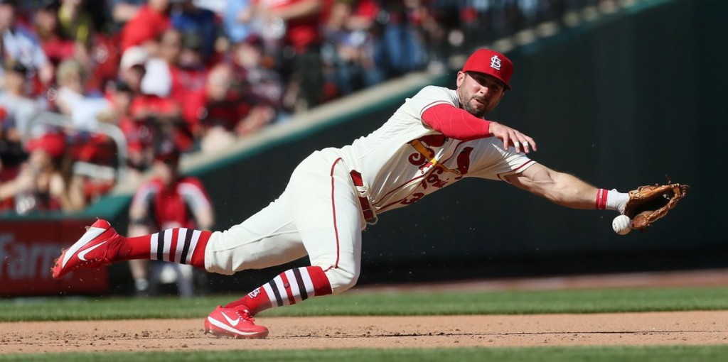 Greg Garcia, is getting the second start in a row at 3B for the Cardinals.  This is him making a diving catch against the Reds at Busch Stadium earlier in the year.  (Chris Lee - St. Louis Post Dispatch) 