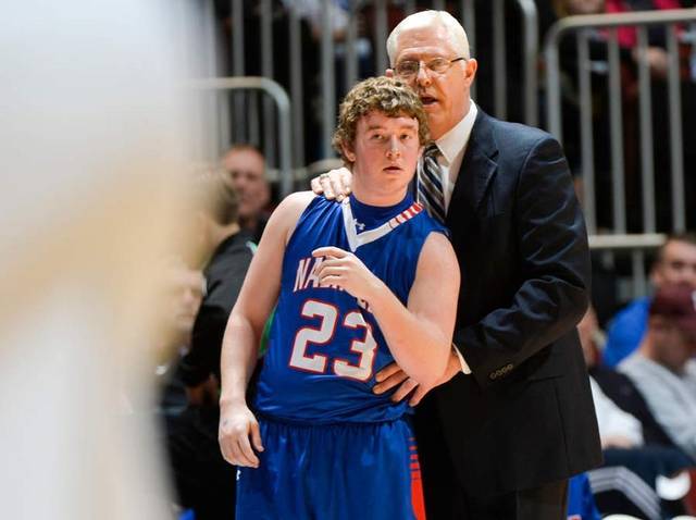 Nashville head coach Brad Weathers has a word with player Kyle Jasper before he enters the game last season. Weathers announced his resignation after eight years. Ron Johnson Peoria Journal Star